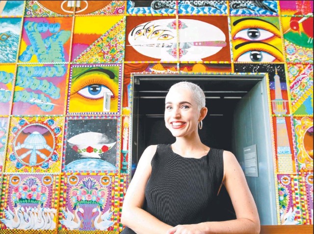 WONDER WALL: Jaala Alex, of New Farm, in front of Iranian artist Iman Raad's Days of bliss and woe at GOMA. Picture: AAP/Steve Pohlner